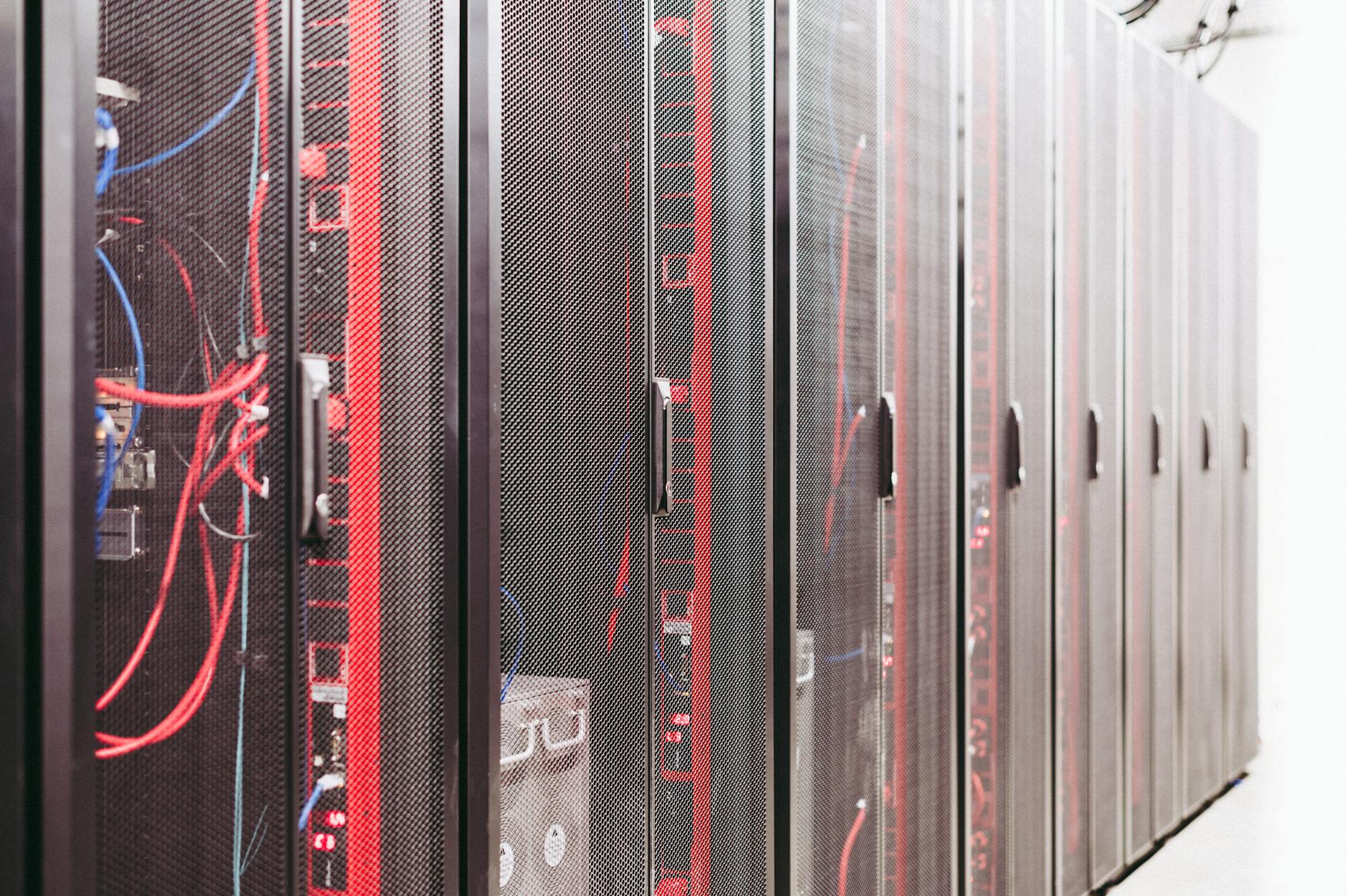 Server room with blinking network equipment and cable management